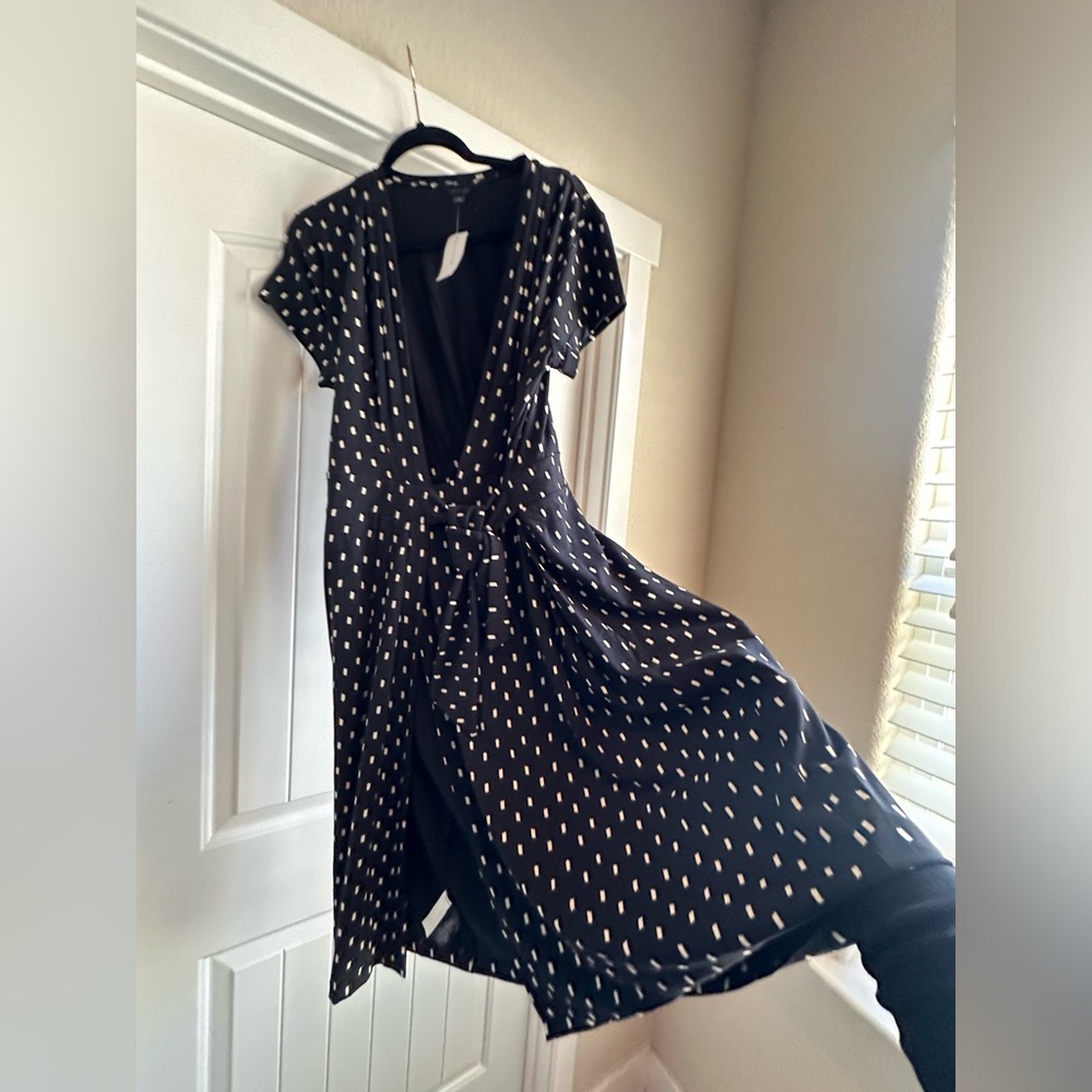 Women’s black and white wrap dress by Anne Taylor. Size 14.